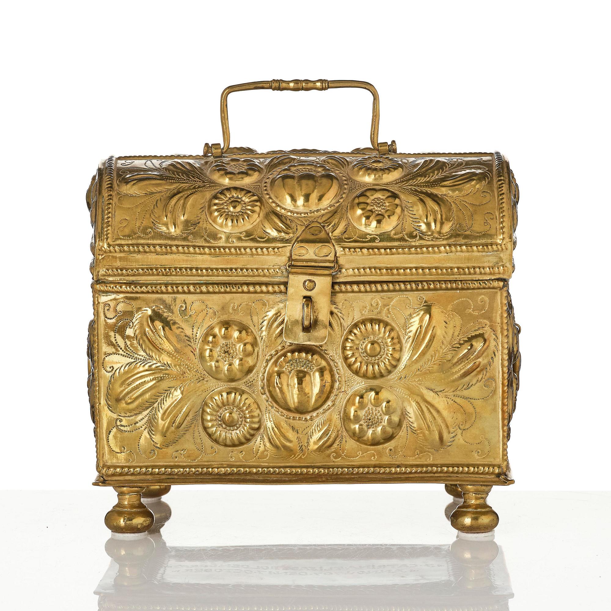 A Swedish baroque repousse brass box, dated 1707.