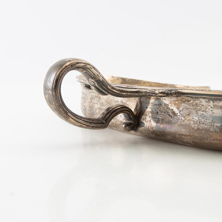 A Fabergé silver table crumber, mark of workmaster Julius Rappoport, St. Petersburg (1883 - 1899).