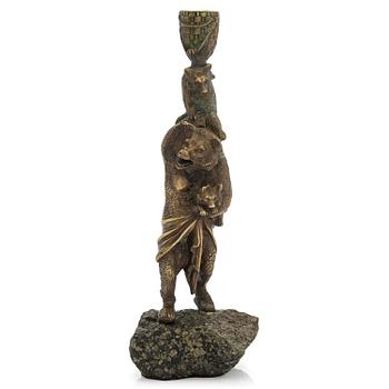 A Russian bronze candle holder, circa 1900.