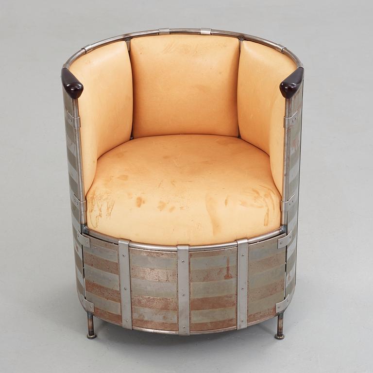 Mats Theselius, an 'Älgskinnsfåtöljen' easy chair by Källemo, Sweden, post 1991.