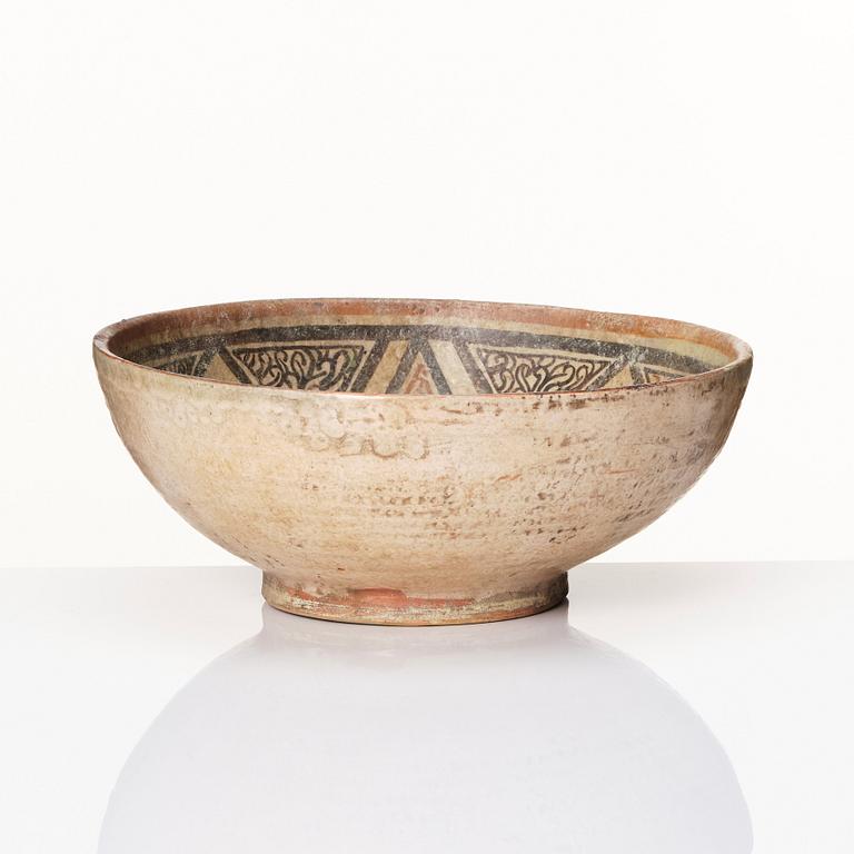 A Nishapur or Samarkand slipware pottery bowl, Iran or central Asia 18th century.