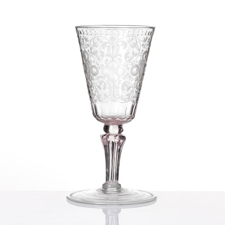 A large engraved and cut glass goblet, 18th Century.