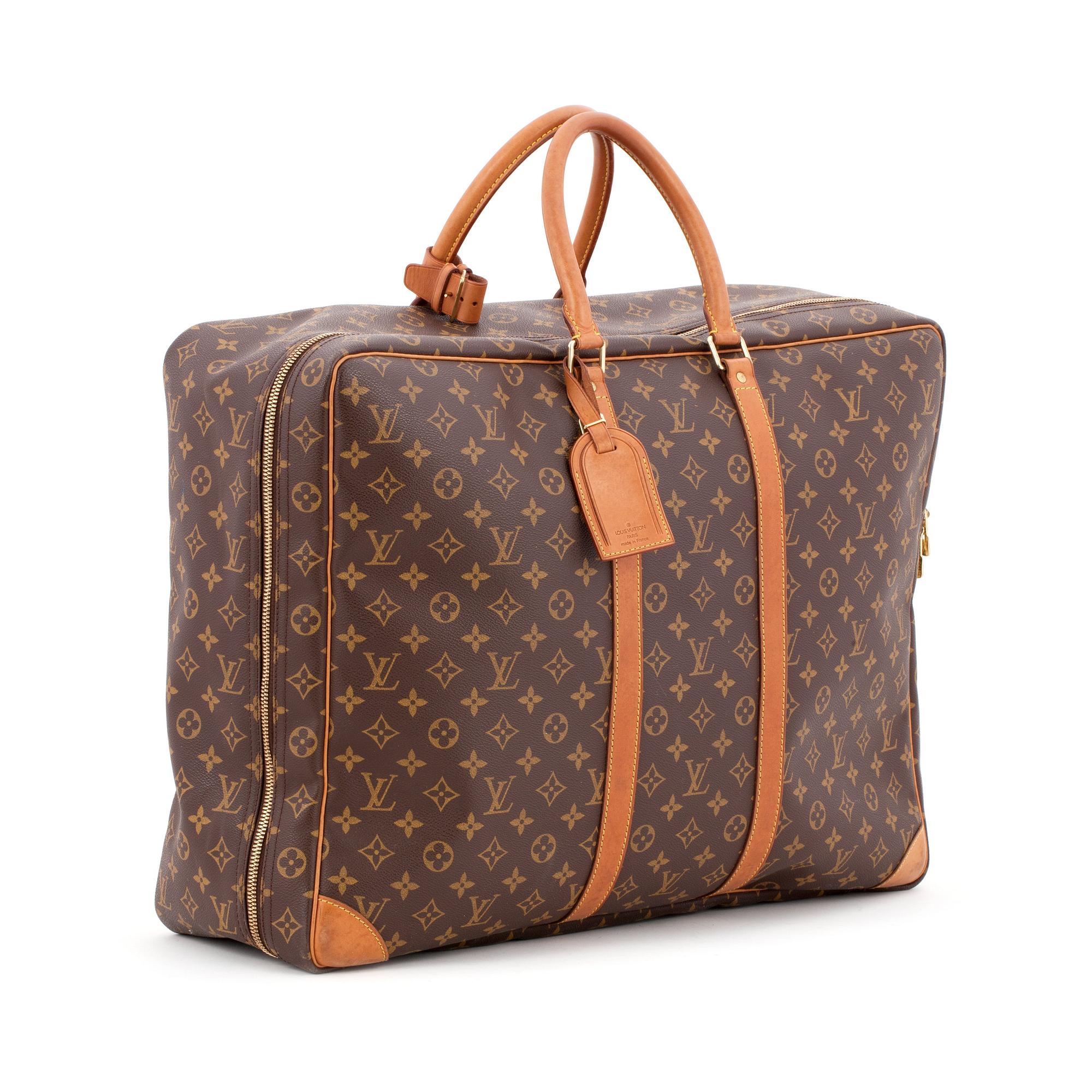 LOUIS VUITTON, a monogram canvas travelling bag "Sirius".
