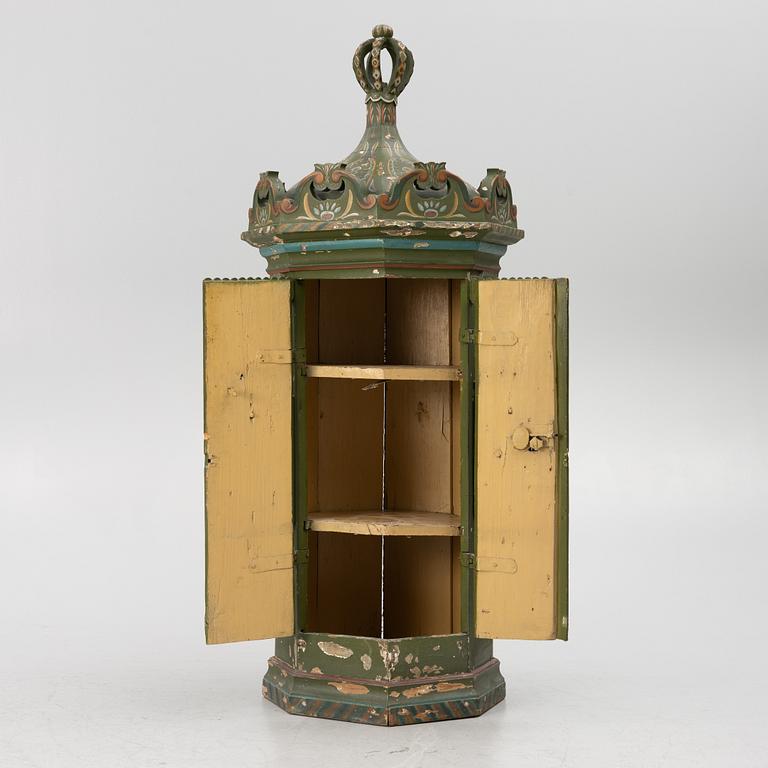 Corner cabinet, likely 18th century.