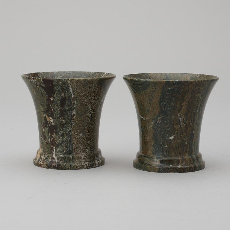 A pair of Swedish green marble beakers.