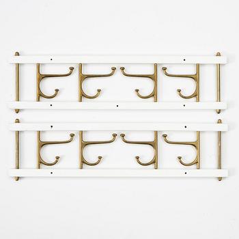 Klädhängare, ett par, "Dekorativ", Skoglunds metallgjuteri, Anderstorp, 1950-/60-tal.