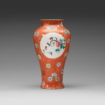 91. A famille rose vase , Qing dynasty, 19th century with Qianlong sealmark in red.