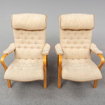 GUSTAV AXEL BERG, a pair of 'Peter' easy chairs, Bröderna Andersson.