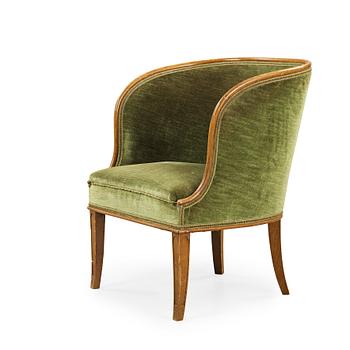 A 'Bellman' elm armchair, attributed to Axel Einar Hjorth, Nordiska Kompaniet, Sweden ca 1929.