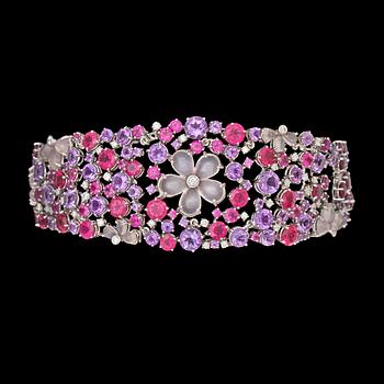 1028. A multi coloured precious stone and brilliant cut diamond bracelet.