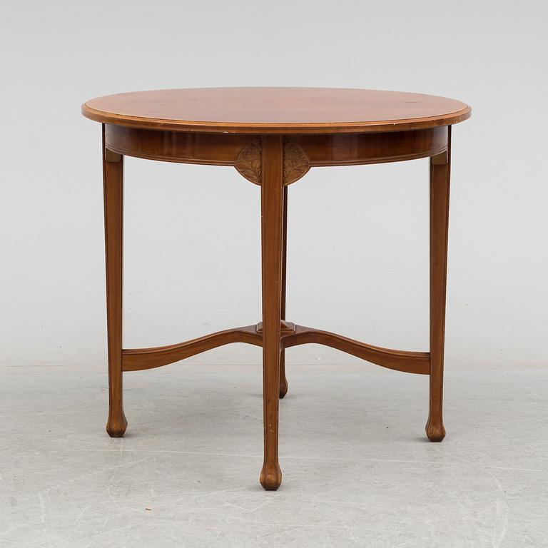 An early 20th century art nouveau table.