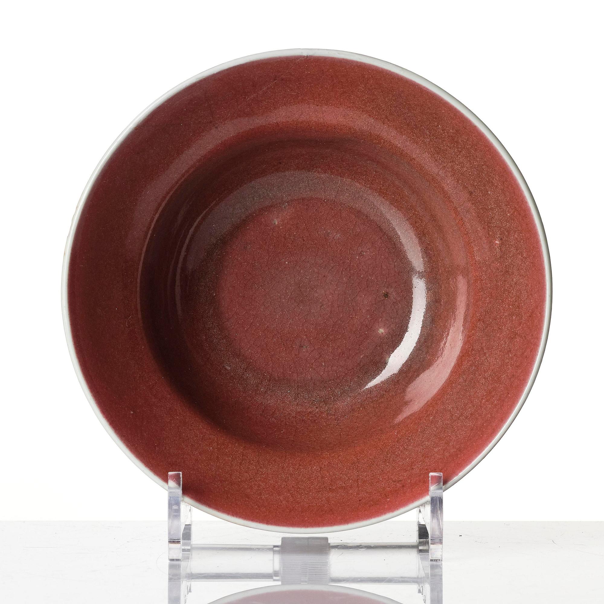 A red glazed bowl, Qing dynasty, 18th century.