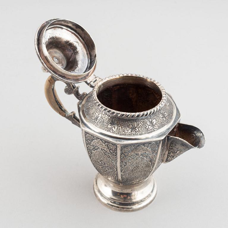 A persian silver coffee-pot and creamer, Iran Isfahan, late Pahlavi dynasty.