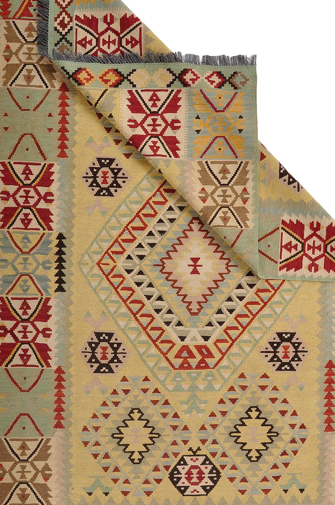 A kilim rug, approximately 245 x 150 cm.