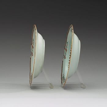 A pair of famille rose 'double peacock' dishes, Qing dynasty, Qianlong (1736-1795).