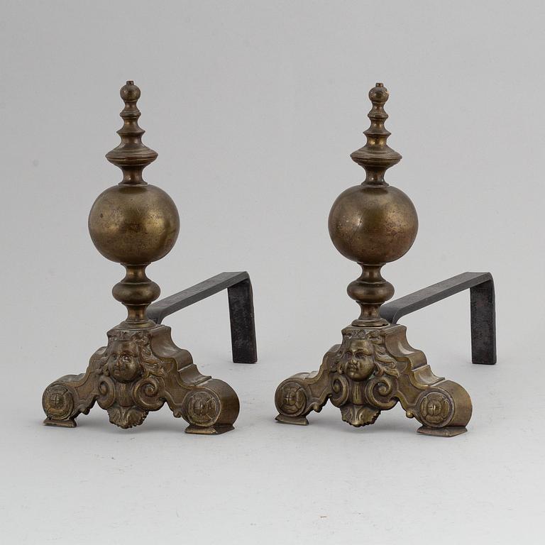 A pair of Louis XVI-style brass andirons.
