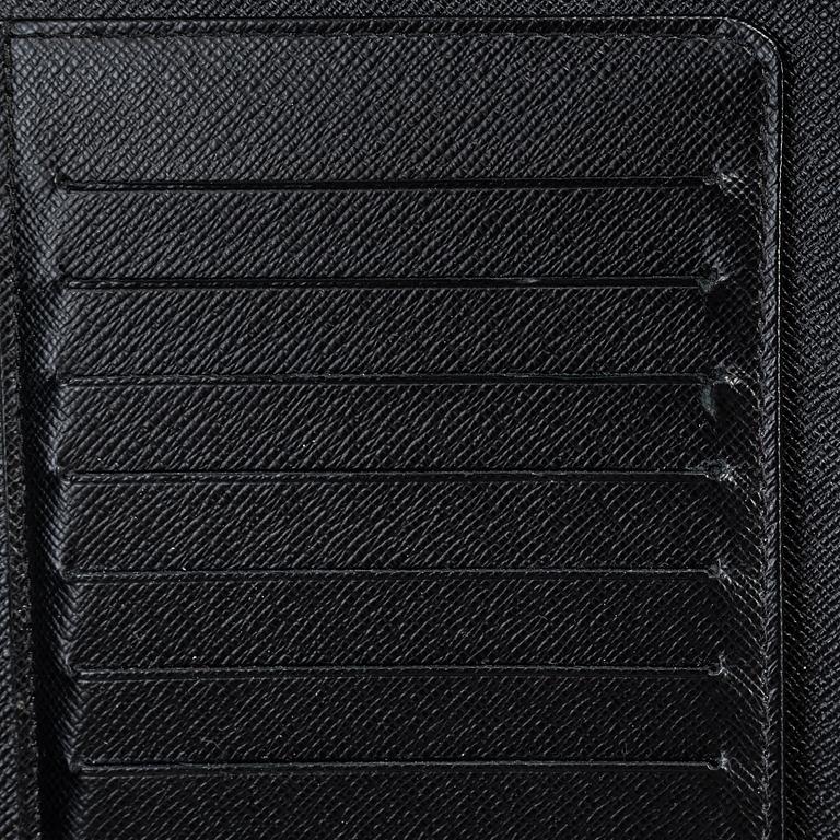 LOUIS VUITTON, an 'Atoll Ardiose' Taiga leather trave organizer, 2015.