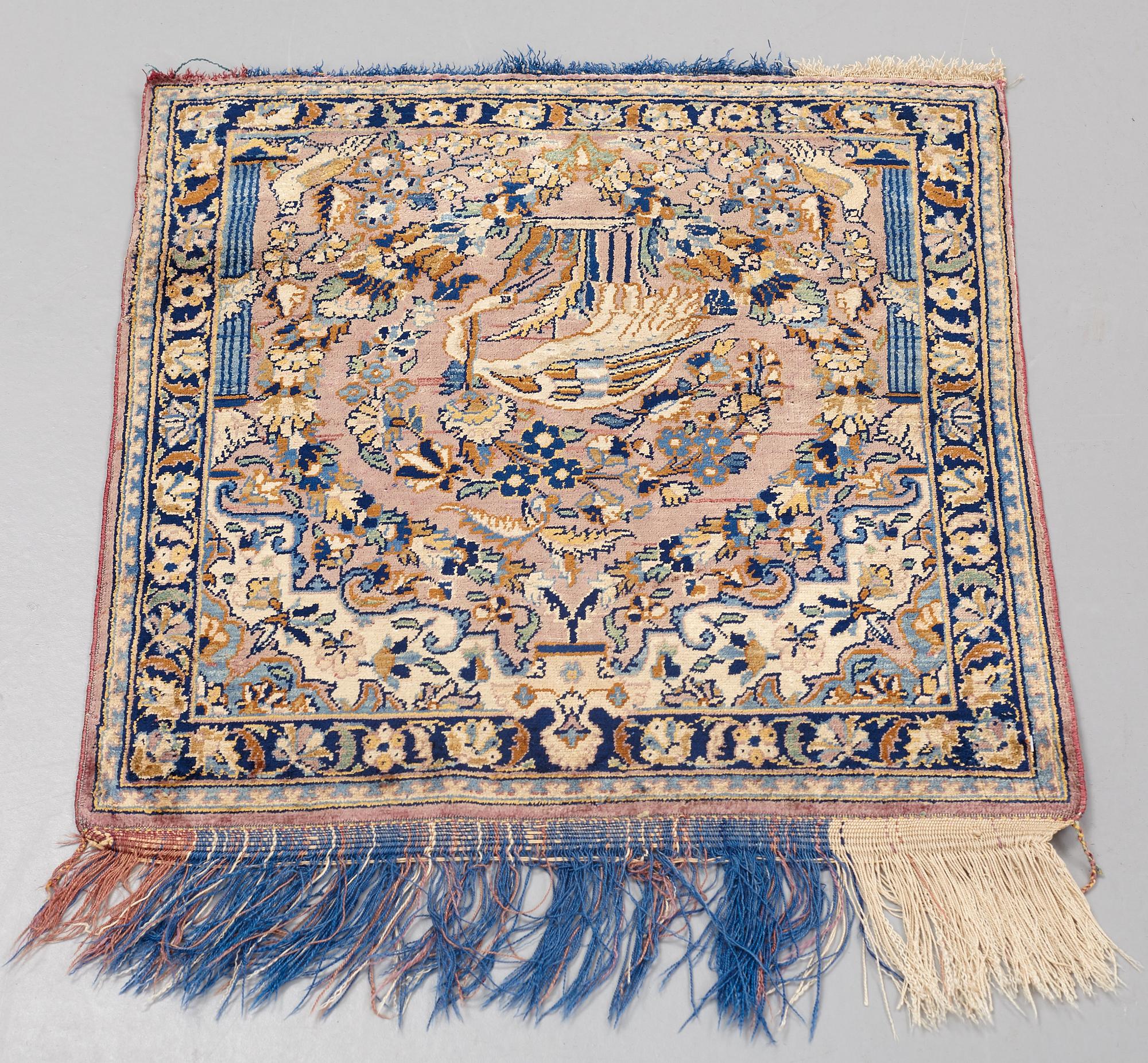 MATTO, a semi-antique silk Kashan possibly Motachem, ca 51-52,5 x 48.5-51 cm.