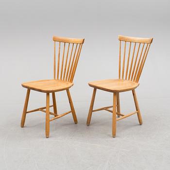 A pair of 'Lilla Åland' chairs by Carl Malmsten, second half of the 20th century.