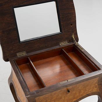 A Louis XV-style sewing table, 19th century.