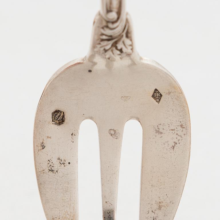 A set of twelve silver oyster forks, mark of Henri Soufflot, 1884-1910. French export mark.