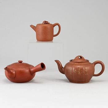 A group of three yixing pots, 20th century.