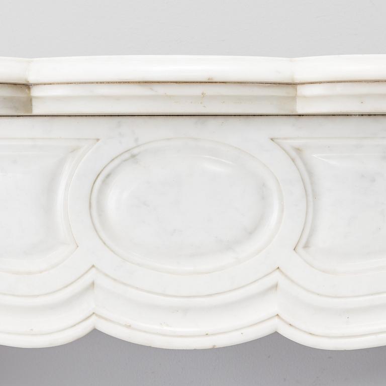 Four marble fireplace parts from around year 1900.