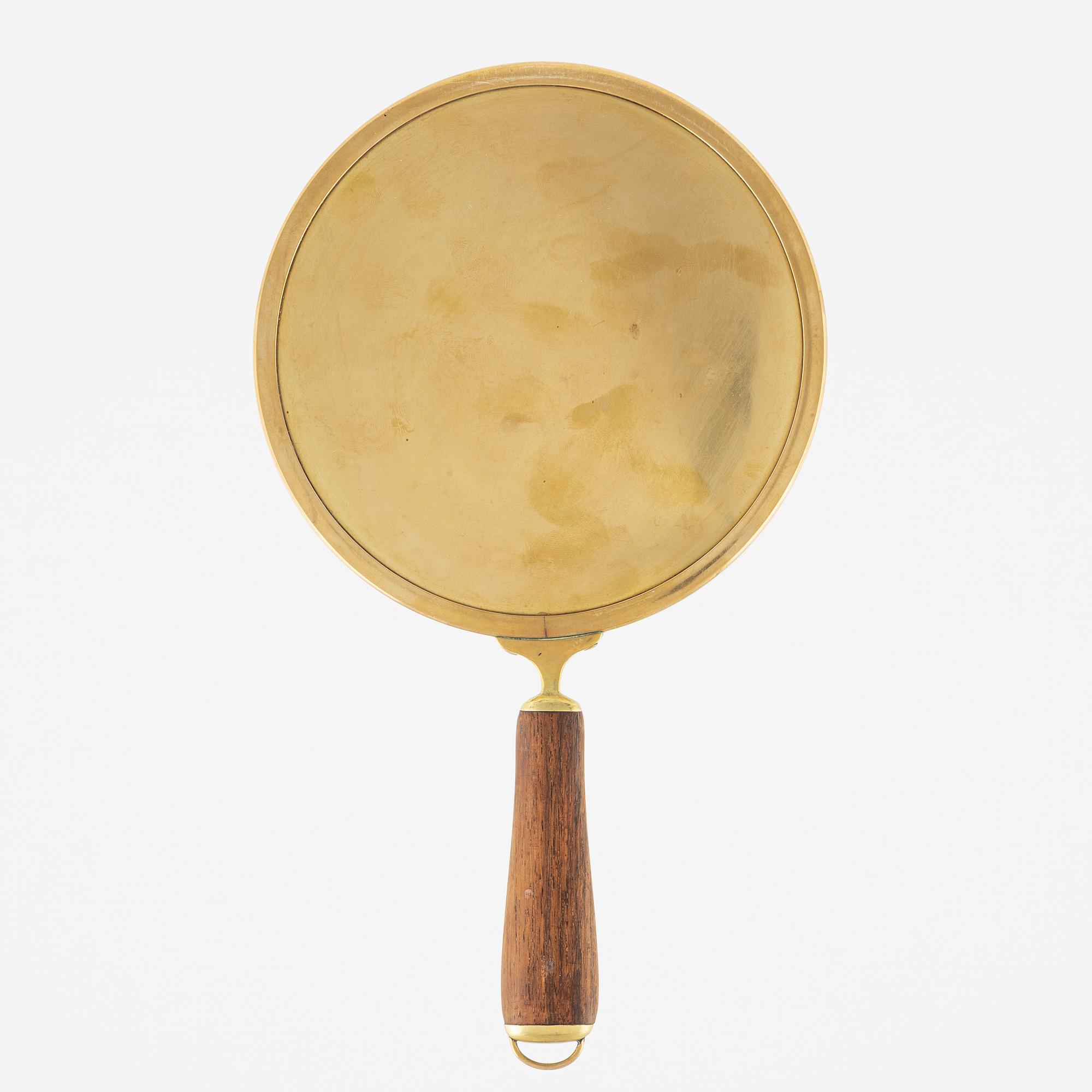 A hand mirror by Svenskt Tenn, model number H 2156, designed in 1935-36.