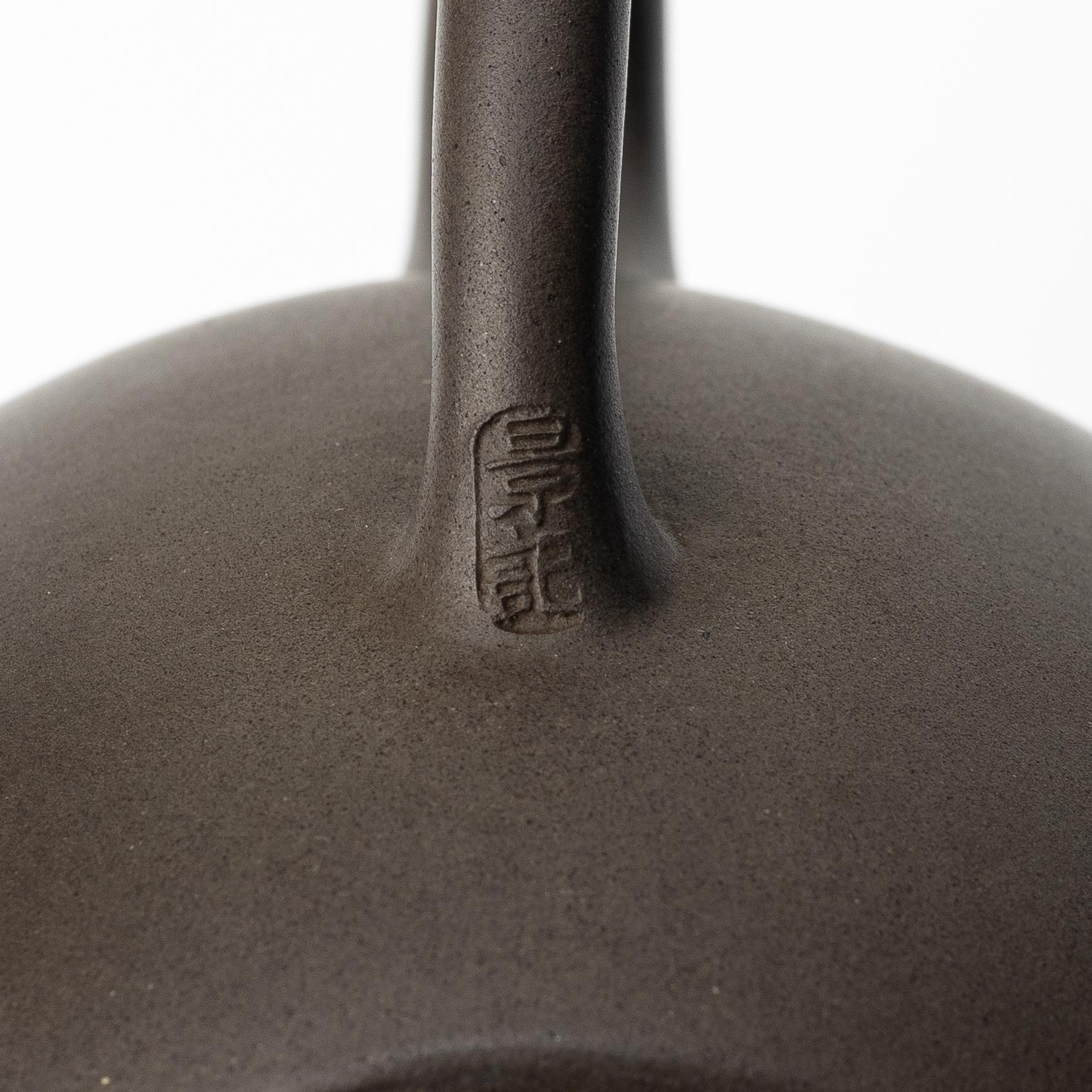 Gu Jingzhou, A dark yixing teapot, 1980s.