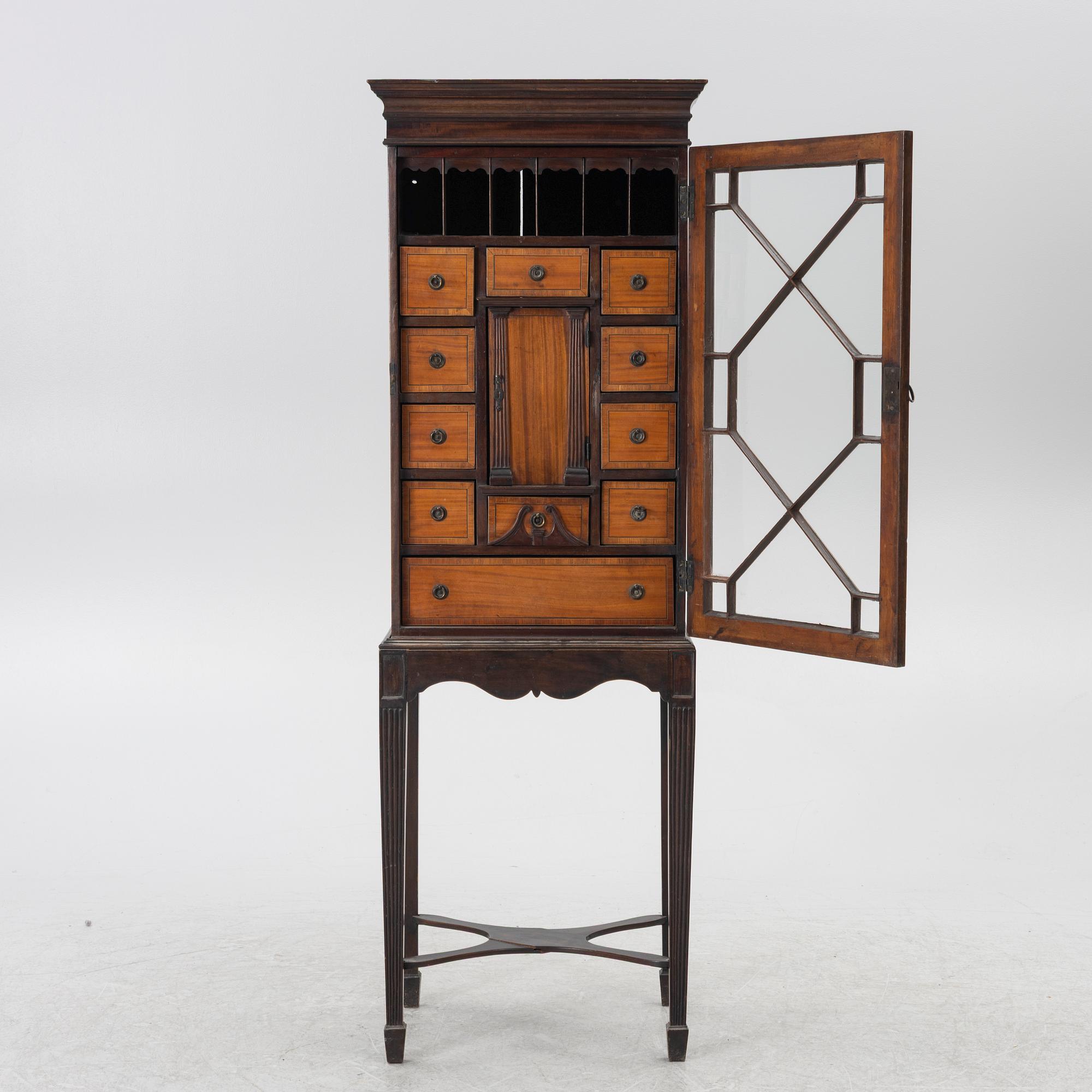 Display cabinet, likely England 19th century.