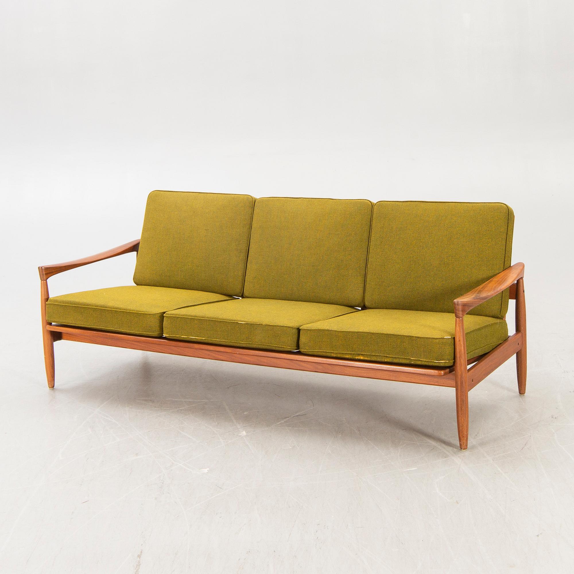 An Erik Wörtz 1962 walnut Kolding sofa for IKEA.