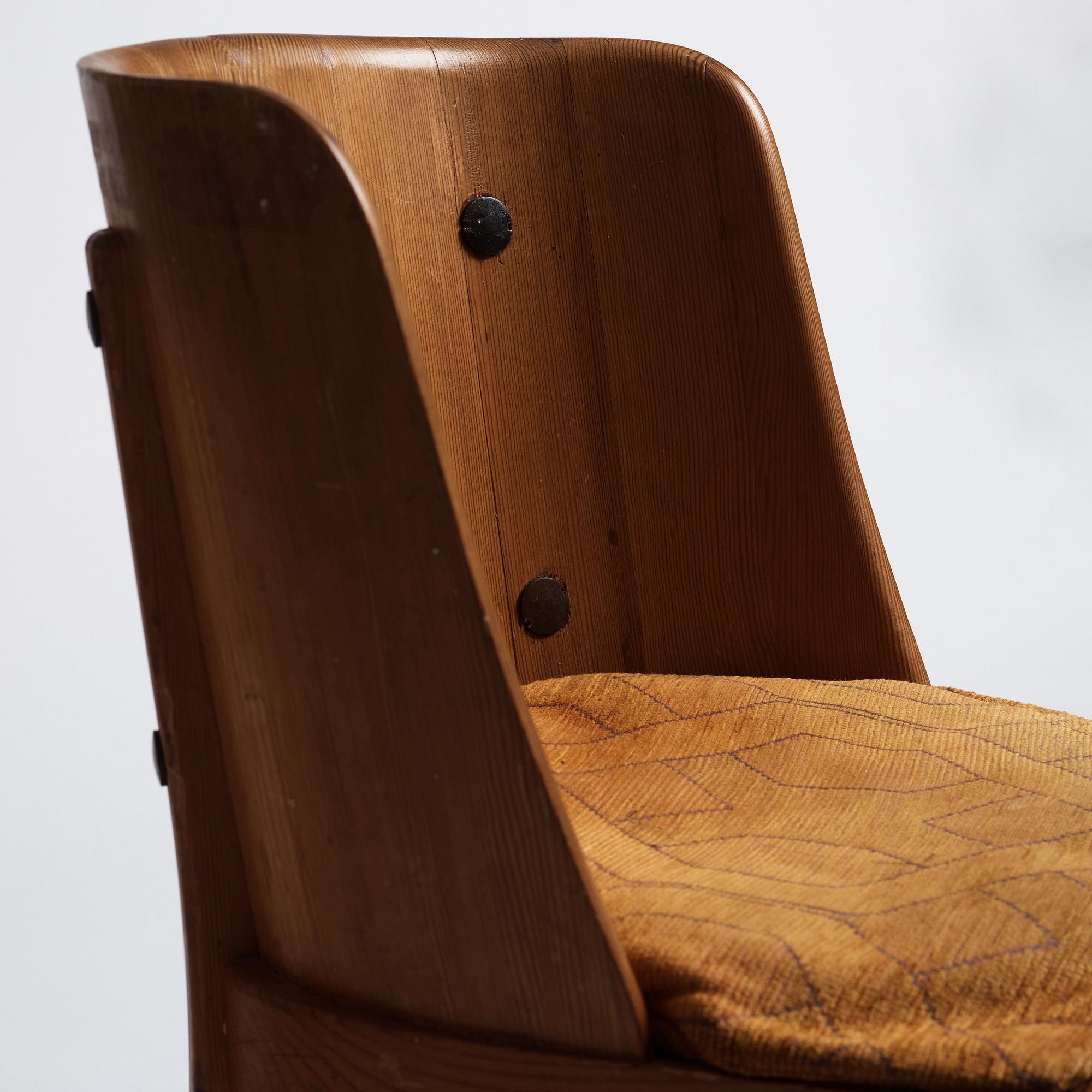 Axel Einar Hjorth, a pair of stained pine 'Lovö' chairs, Nordiska Kompaniet, Sweden 1930s.