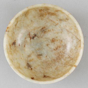 A carved nefrite bowl, Qing dynasty.