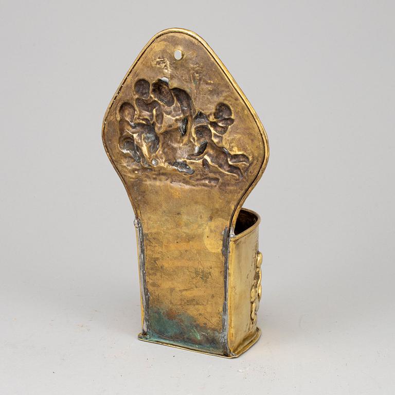 An 18th century brass cutlery holder.