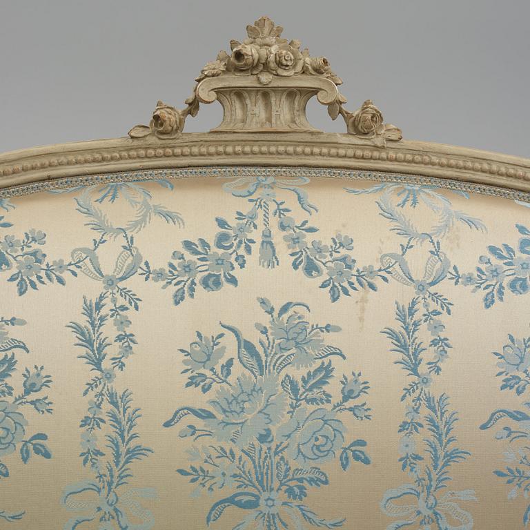 A grey-painted Gustavian 'canapé en corbeille'. sofa, by J E Höglander.