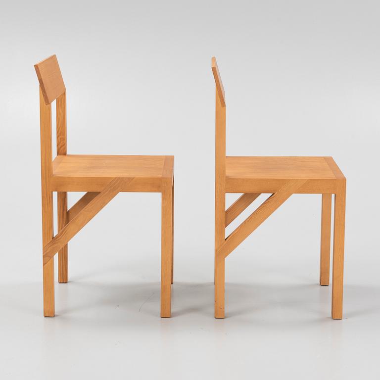 A pair of signed stained pine 'Bracket Chairs' by Frederik Gustav for Frama, Copenhagen 2023.