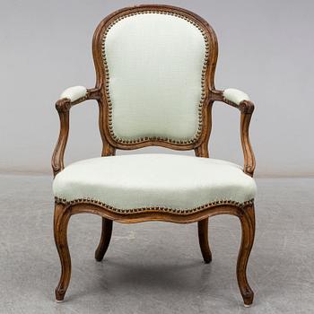 A French 18th century Louis XV armchair.
