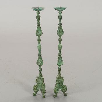 A pair of 20th century 
floor candlesticks.