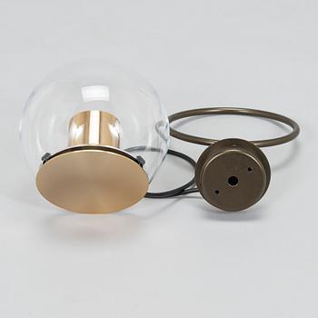 Joe Colombo, a 21st century 'The Globe 727' wall light, for Oluce.