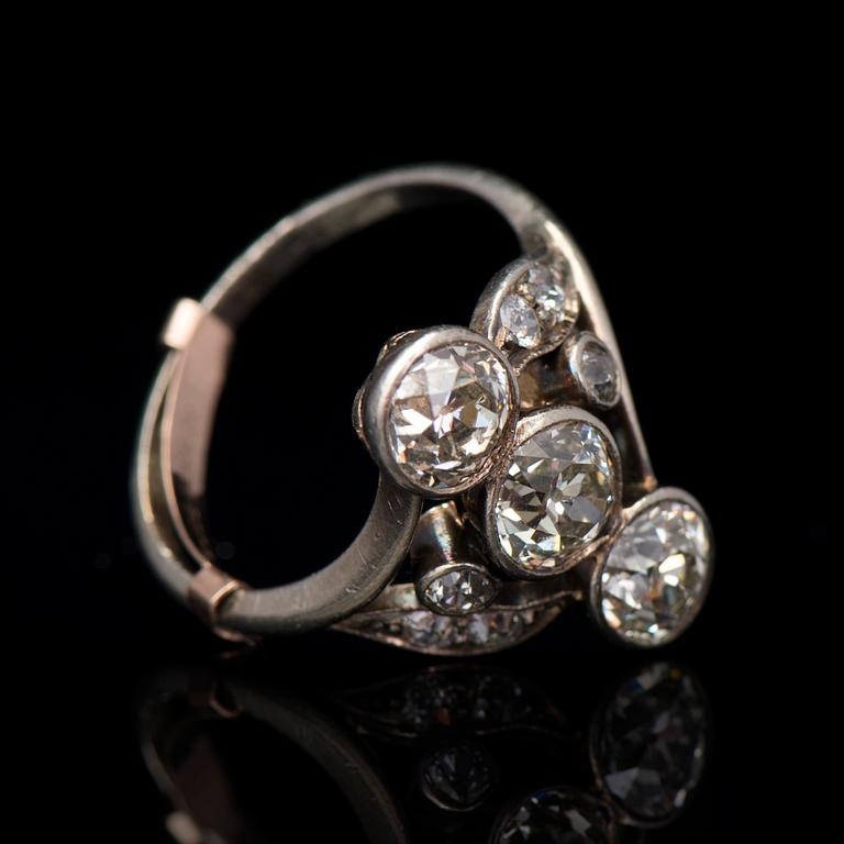 A RING, old cut diamonds, silver.