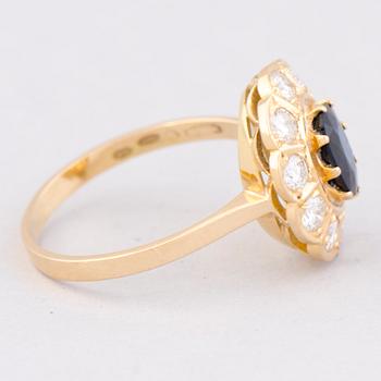 RING, fasettslipad safir, briljantslipade diamanter, 18K guld. Meidän Sepät, Esbo 1991.