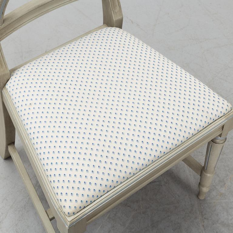 A dining table and six chairs, Gustavian style, second half of the 20th century. One leaf included.