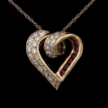 HÄNGE, 14k guld med rubiner och briljantslipade diamanter tot ca0,35ct. 2000-tal. Vikt 3,3g.