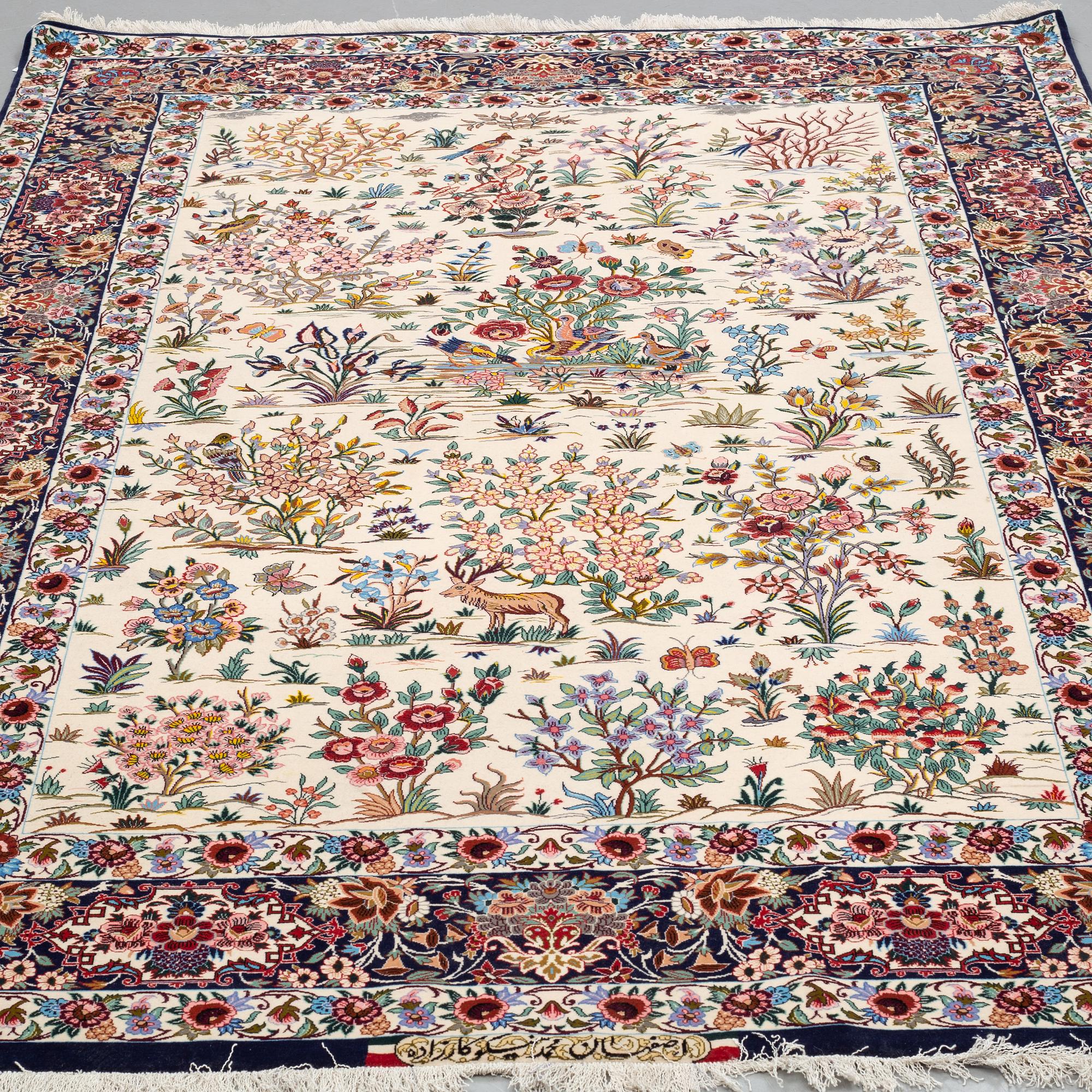 A CARPET, Esfahan, Signed Esfahan Miko Karzaadeh, around 239 x 157 cm.
