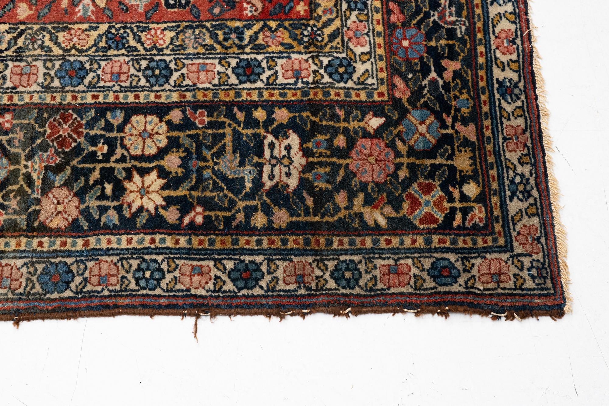 A Bakhtiari carpet, signed, c. 580 x 212 cm.