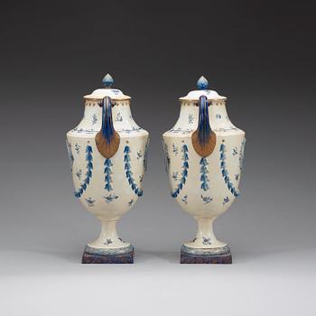 A pair of 'Marieberg shaped' jars with covers, Qing dynasty, Jiaqing (1796-1820).