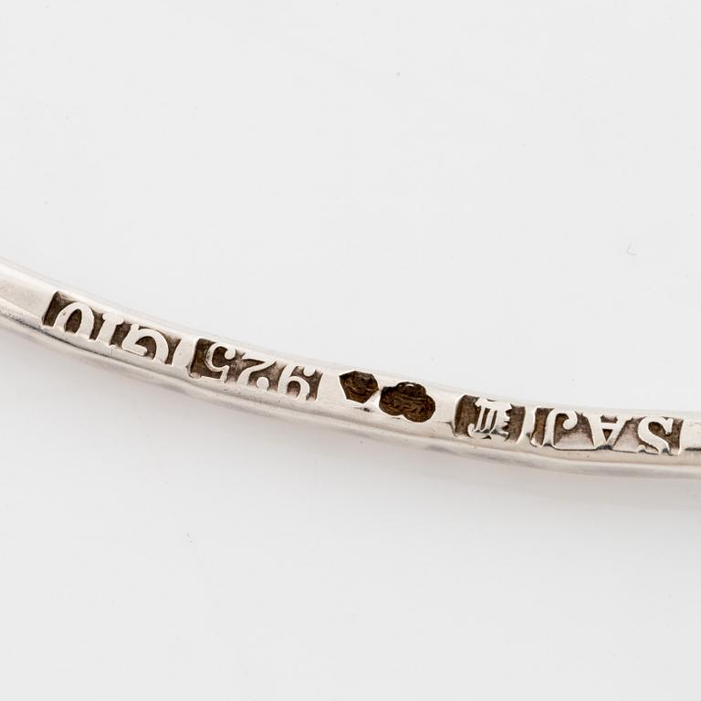 Annie Jägbeck silver necklace and earrings.