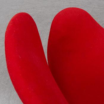 A 'Swan' chair by Arne Jacobsen for Fritz Hansen, designed 1958.