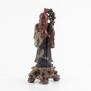 A Chinese soapstone figure of Shoulao, 20th century.