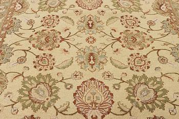 An oriental carpet with Mamluk design, c. 294 x 250 cm.
